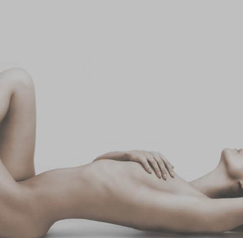 Nude woman reclining